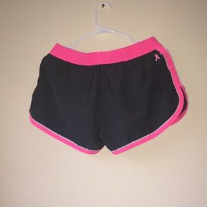 Black and pink Nike shorts